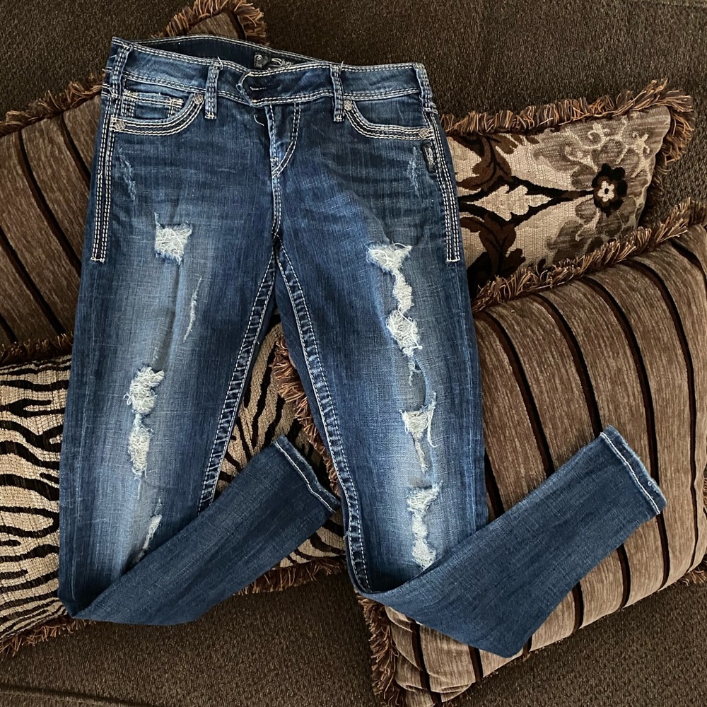 Silver skinny jeans.